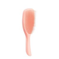 Product  container  of  Tangle  Teezer  Wet  Detangler  Large  Hairbrush  by  Tangle  Teezer,  a  brush  indicated  for  detangling  wet  hair.