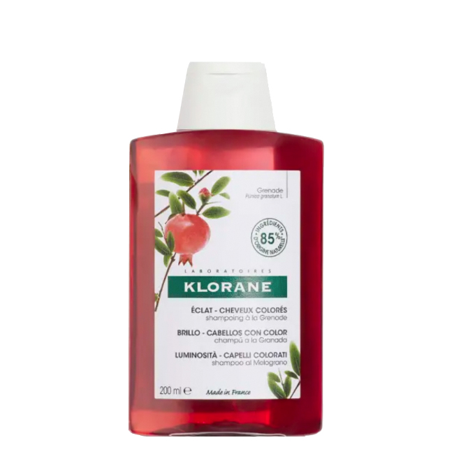 Klorane Roma Shampoo Coloracao Bottle of Klorane Pomegranate Shampoo Shine and Color by Klorane, a shampoo indicated for protecting and enhancing hair color.
