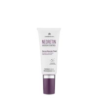 Bottle  of  Discrom  Control  Serum  Depigmentation  Booster  Fluid  by  Neoretin,  a  serum  indicated  for  controlling  skin  pigmentation.