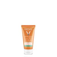 Bottle  of  Vichy  Capital  Soleil  Tinted  Dry  Touch  Face  Fluid  SPF50  by  Vichy,  a  BB  cream  indicated  for  sun  protection  and  matifying.
