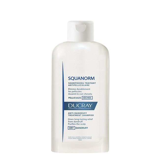 ducray_squanorm._champ_caspa_seca_200ml Bottle of Ducray Squanorm Shampoo Dry Dandruff by Ducray, a shampoo indicated for eliminating dry dandruff and itching.