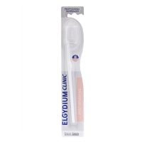 Product  container  of  Elgydium  Clinic  Post-Operative  7/100  by  Elgydium,  a  soft  toothbrush  indicated  for  post-surgery  care.