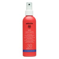 Spray  of  Apivita  Bee  Sun  Safe  Hydra  Melting  Ultra-Light  Face  and  Body  Spray  by  Apivita,  a  mist  indicated  for  SPF30  sun  protection.