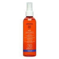 Bottle  of  Apivita  Bee  Sun  Safe  Satin  Touch  Tan  Perfecting  Body  Oil  by  Apivita,  an  oil  indicated  for  highlighting  a  natural  tan.