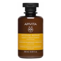 Bottle  of  Apivita  Nourishing  and  Repairing  Shampoo,  a  creamy  shampoo  indicated  for  nourishing  dry  and  damaged  hair.