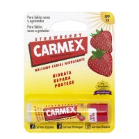 Product  container  of  Carmex  Strawberry  Lip  Balm  SPF15  by  Carmex,  a  lip  balm  indicated  for  moisturizing  dry  and  chapped  lips.