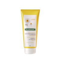 Bottle  of  Klorane  Blond  Highlights  Conditioner  with  Chamomile  by  Klorane,  a  hair  balm  indicated  for  brightening  blond  hair.
