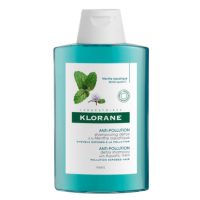 Bottle  of  Klorane  Anti-Pollution  Detox  Shampoo  With  Aquatic  Mint  by  Klorane,  a  shampoo  indicated  for  purifying  and  refreshing  hair.