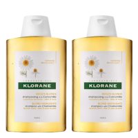 Bottle  of  Klorane  Chamomile  Shampoo  Pack  by  Klorane,  a  shampoo  indicated  for  illuminating  golden  highlights  of  blonde  hair.