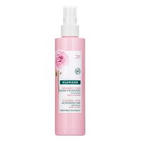 Spray  of  Klorane  Peony  Moisturizing  Body  Haze  by  Klorane,  a  body  mist  indicated  for  calming  and  refreshing  sensitive  skin.