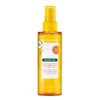 Bottle  of  Klorane  Polysianes  Dry  Sun  Oil  by  Klorane,  a  solar  oil  indicated  for  body  and  hair  sun  protection.