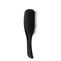 Product  container  of  Tangle  Teezer  Wet  Detangler  Brush  by  Tangle  Teezer,  a  hair  brush  indicated  for  detangling  wet  and  dry  hair.