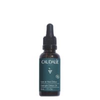 Bottle  of  Caudalie  Overnight  Detox  Oil  by  Caudalie,  a  dry  oil  indicated  for  overnight  skin  regeneration  and  nourishment.