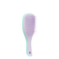 Product  container  of  Tangle  Teezer  Mini  Wet  Detangler  Mint/Lilac  Hairbrush,  a  brush  indicated  for  detangling  wet  and  dry  hair.