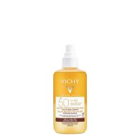 Spray  of  Vichy  Capital  Soleil  Solar  Protective  Water  Enhanced  Tan  SPF  50  by  Vichy,  a  water  spray  indicated  for  a  luminous  tan.