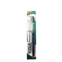 Product  container  of  GUM  Original  White  Medium  Toothbrush  563  by  GUM,  a  toothbrush  indicated  for  restoring  the  natural  color  of  teeth.