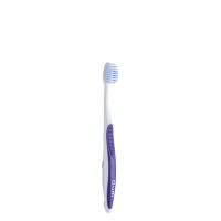 Product  container  of  GUM  Ortho  Medium  Toothbrush  124  by  GUM,  a  toothbrush  indicated  for  orthodontic  appliance  hygiene.