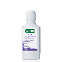Bottle  of  GUM  Ortho  Mouthwash  by  GUM,  a  liquid  mouthwash  indicated  for  complete  mouth  hygiene  in  orthodontic  patients.