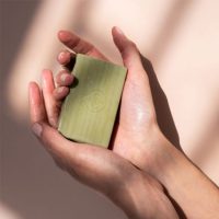 a solid soap indicated for cleansing and moisturizing dry skin.
