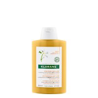 Bottle  of  Klorane  Solar  Tamanu  and  Monoi  Bio  Shampoo  by  Klorane,  a  shampoo  indicated  for  repairing  sun-damaged  hair.