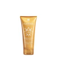 Bottle  of  Rene  Furterer  5  Sens  Shampoo  by  Rene  Furterer,  a  shampoo  indicated  for  cleansing  and  restoring  hair  shine.