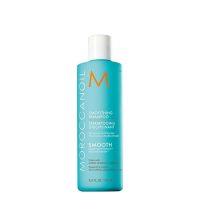 Bottle  of  Moroccanoil  Smoothing  Shampoo  by  Moroccanoil,  a  smoothing  shampoo  indicated  for  nourishing  and  detangling  frizzy  hair.