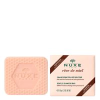 Product  container  of  Nuxe  Rêve  de  Miel  Gentle  Shampoo  Bar  by  Nuxe,  a  solid  shampoo  indicated  for  gentle  hair  cleansing.