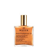 Bottle  of  Nuxe  Huile  Prodigieuse  OR  Dry  Oil  by  Nuxe,  a  dry  oil  with  gold  pigments  indicated  for  illuminating  face,  body  and  hair.