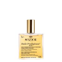 Bottle  of  Nuxe  Huile  Prodigieuse  Riche  Rich  Oil  by  Nuxe,  a  rich  dry  oil  indicated  for  nourishing  very  dry  skin  and  hair.