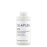 Bottle  of  Olaplex  Nº  5  Bond  Maintenance  Conditioner  by  Olaplex,  a  conditioner  indicated  for  hydrating  and  repairing  hair  damage.