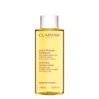 Bottle  of  Clarins  Hydrating  Toning  Lotion  by  Clarins,  a  fluid  lotion  indicated  for  hydrating  and  rebalancing  normal  to  dry  skin.