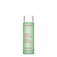 Bottle  of  Clarins  Purifying  Toning  Lotion  by  Clarins,  a  fluid  lotion  indicated  for  purifying  and  regulating  oily  skin  shine.
