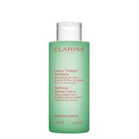 Bottle  of  Clarins  Purifying  Toning  Lotion  by  Clarins,  a  fluid  lotion  indicated  for  purifying  and  regulating  oily  skin  shine.