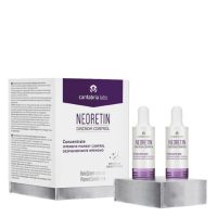 Box  of  Neoretin  Discrom  Control  Intensive  Pigment  Control  Concentrate  Duo  by  Neoretin,  a  concentrate  for  melanin  control.