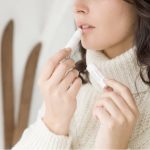 a moisturizing stick indicated for dry and chapped lips.