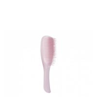 Product  container  of  Tangle  Teezer  Wet  Detangler  Brush  by  Tangle  Teezer,  a  hair  brush  indicated  for  removing  knots  in  wet  hair.