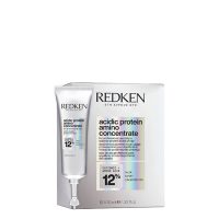 Box  of  Redken  Acidic  Protein  Amino  Concentrate  by  Redken,  a  protein  concentrate  indicated  for  repairing  damaged  and  dry  hair.