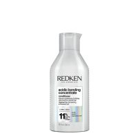 Bottle  of  Redken  Acidic  Bonding  Concentrate  Conditioner  by  Redken,  a  conditioner  indicated  for  fortifying  colored  hair.