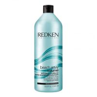 Bottle  of  Redken  Beach  Envy  Volume  Texturizing  Conditioner  by  Redken,  a  conditioner  indicated  for  adding  volume  and  texture.