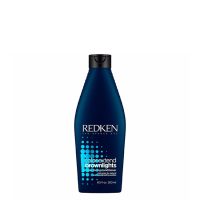 Bottle  of  Redken  Color  Extend  Brownlights  Blue  Toning  Conditioner  by  Redken,  a  conditioner  indicated  for  neutralizing  warm  tones.