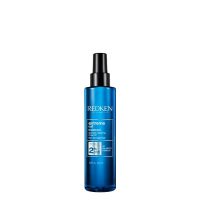 Bottle  of  Redken  Extreme  Cat  Treatment  by  Redken,  a  revitalizing  spray  indicated  for  rebuilding  and  fortifying  damaged  hair.