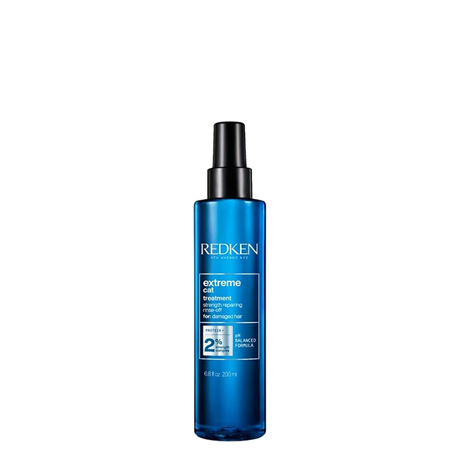 RedkenExtremeCatTreatment200ml Bottle of Redken Extreme Cat Treatment by Redken, a revitalizing spray indicated for rebuilding and fortifying damaged hair.