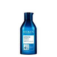 Bottle  of  Redken  Extreme  Strength  Repair  Conditioner  by  Redken,  a  conditioner  indicated  for  strengthening  damaged  hair.