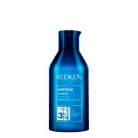 Bottle  of  Redken  Extreme  Strength  Repair  Shampoo  by  Redken,  a  shampoo  indicated  for  cleansing  and  repairing  damaged  hair.