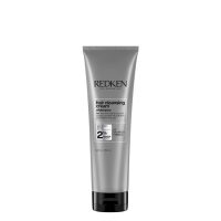 Bottle  of  Redken  Hair  Cleansing  Cream  Shampoo  by  Redken,  a  micellar  shampoo  indicated  for  deep  cleansing  and  neutralizing  odors.