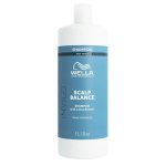 Bottle of Invigo Aqua Pure Purifying Shampoo by Wella Professionals, a shampoo indicated for refreshing and cleansing the scalp.