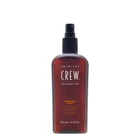 Spray  of  American  Crew  Grooming  Spray,  a  styling  spray  indicated  for  flexible  hold  and  natural  hair  control.