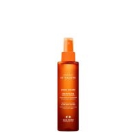 Bottle  of  Esthederm  LHuile  Solaire  Protective  Sun  Care  Oil  by  Esthederm,  a  dry  oil  indicated  for  stimulating  a  natural  tan.