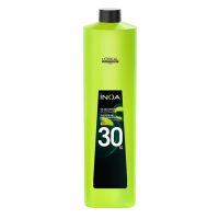 Bottle  of  INOA  30  vol  Rich  Developer  by  LOréal  Professionnel,  a  creamy  liquid  indicated  for  luminous  and  intense  hair  coloring.