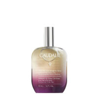 Bottle  of  Caudalie  Smooth  &  Glow  Oil  Elixir  by  Caudalie,  a  dry  oil  indicated  for  nourishing  body  skin  and  hair.